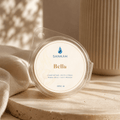 Sankah Bella wax melt packaging on a textured surface with a blurred background